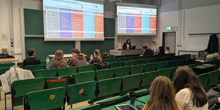 Guest lecturer from Saint-Gobain speaks in front of students